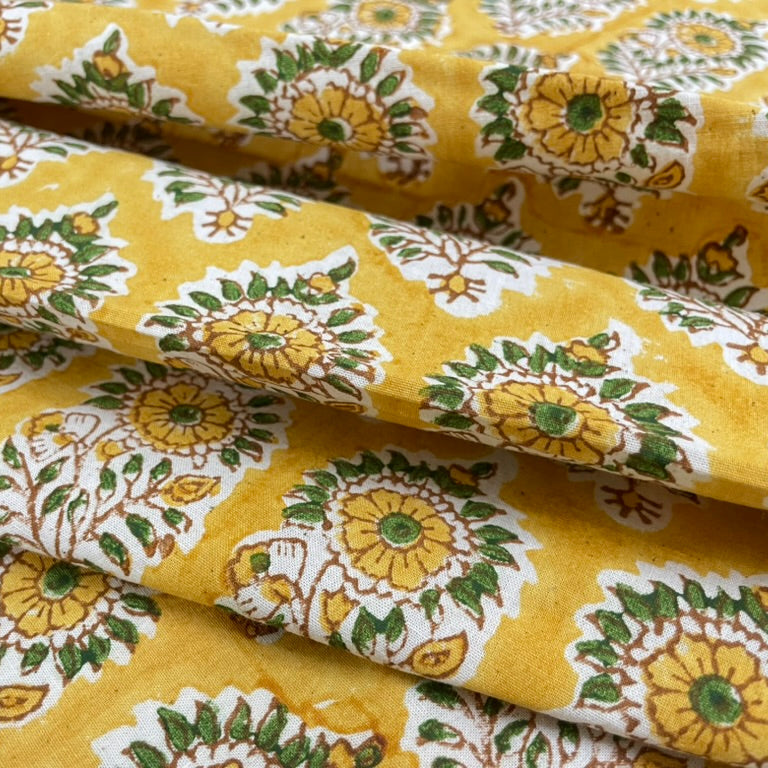 Yellow fabric with floral pattern