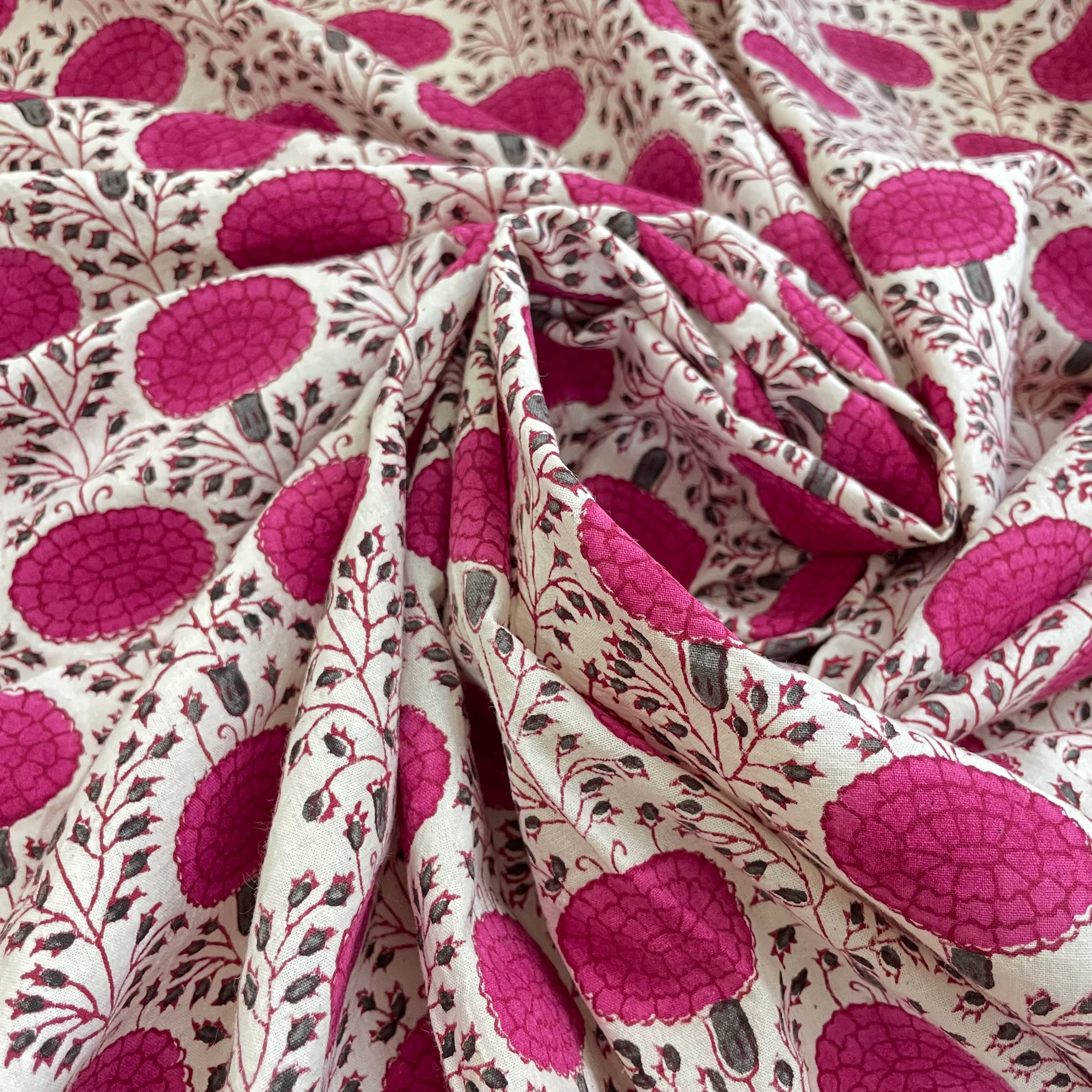 Close-up of fabric with pink and white pattern