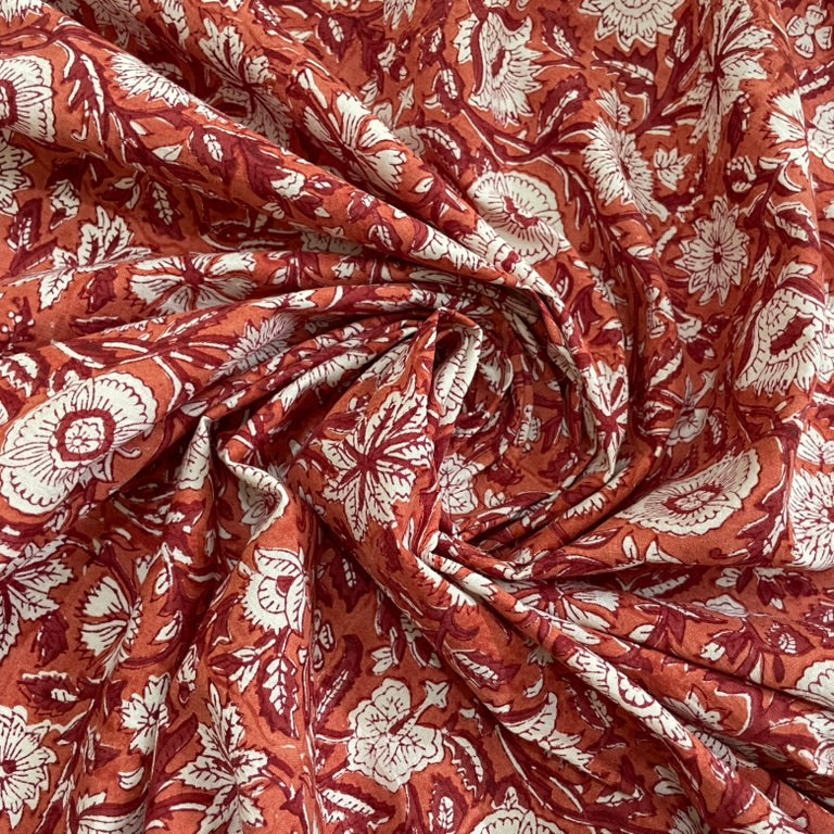 Red and white floral patterned fabric
