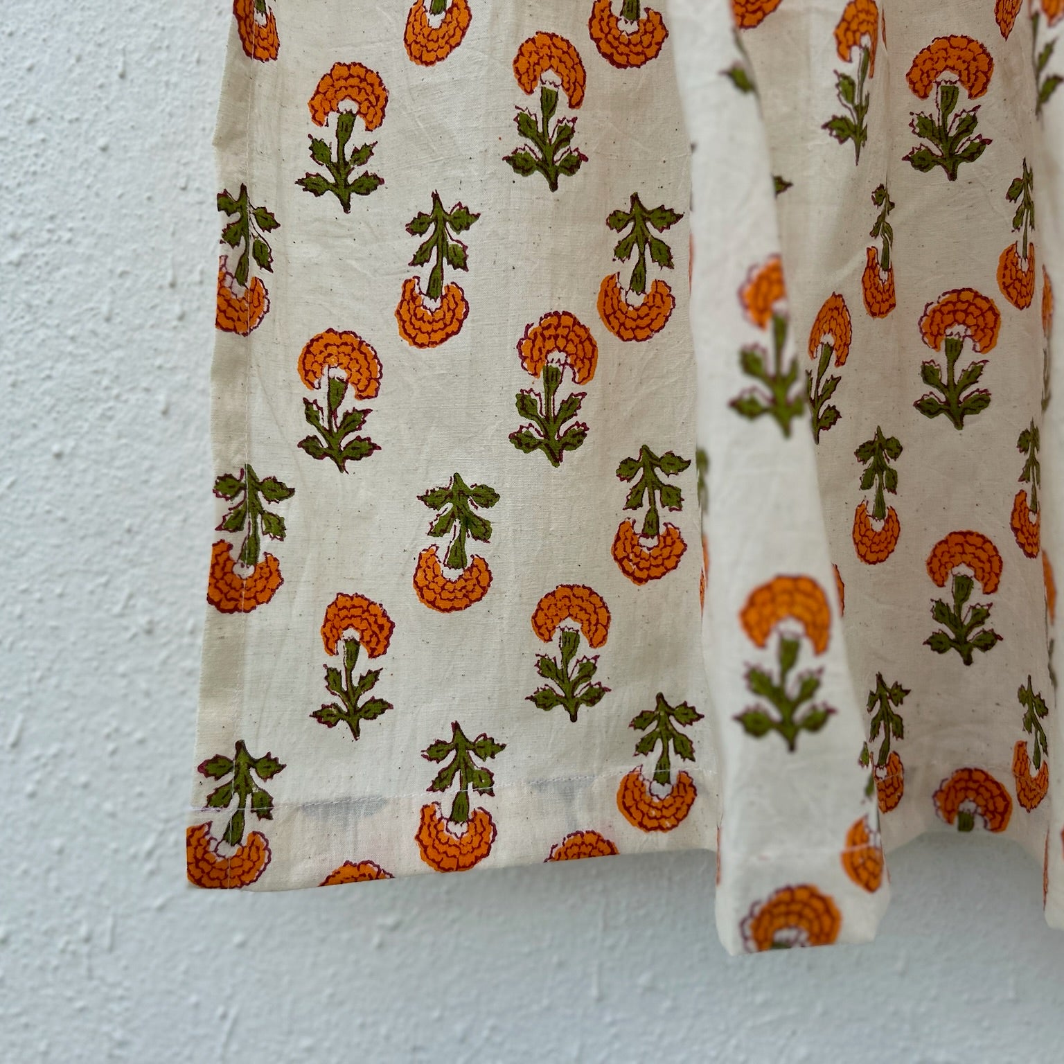 Fabric with floral pattern on a plain background