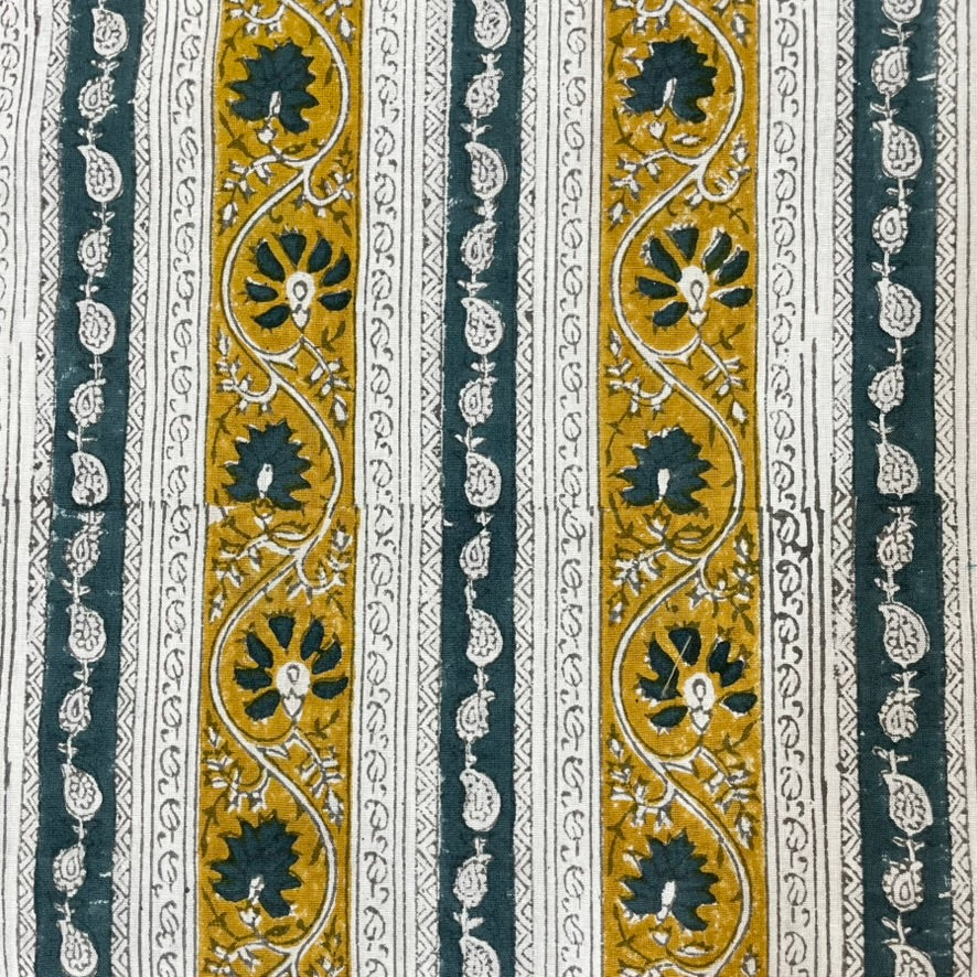 Decorative pattern with Teal, Mustard, and white design on a striped hand block print