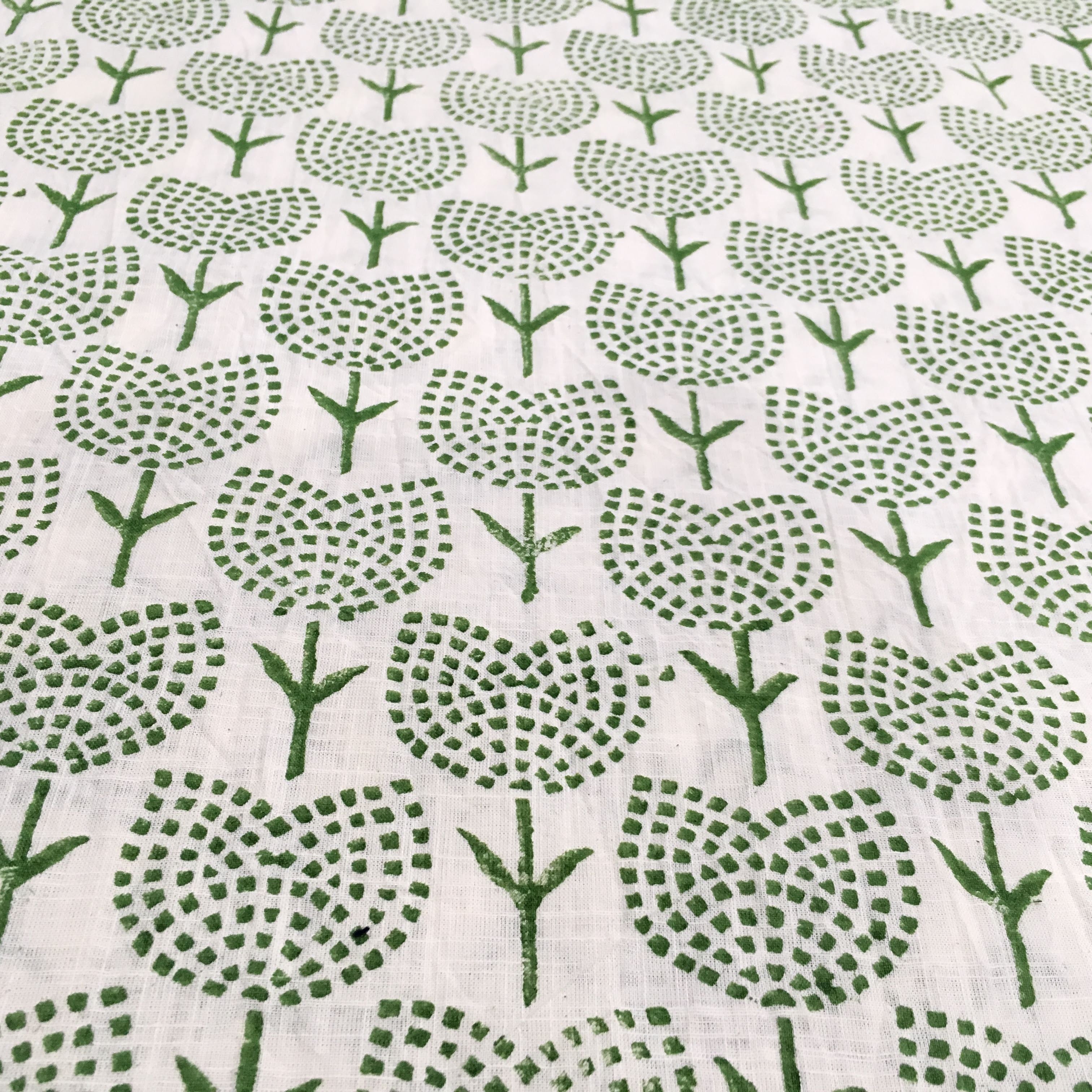 Green tree pattern on a white background