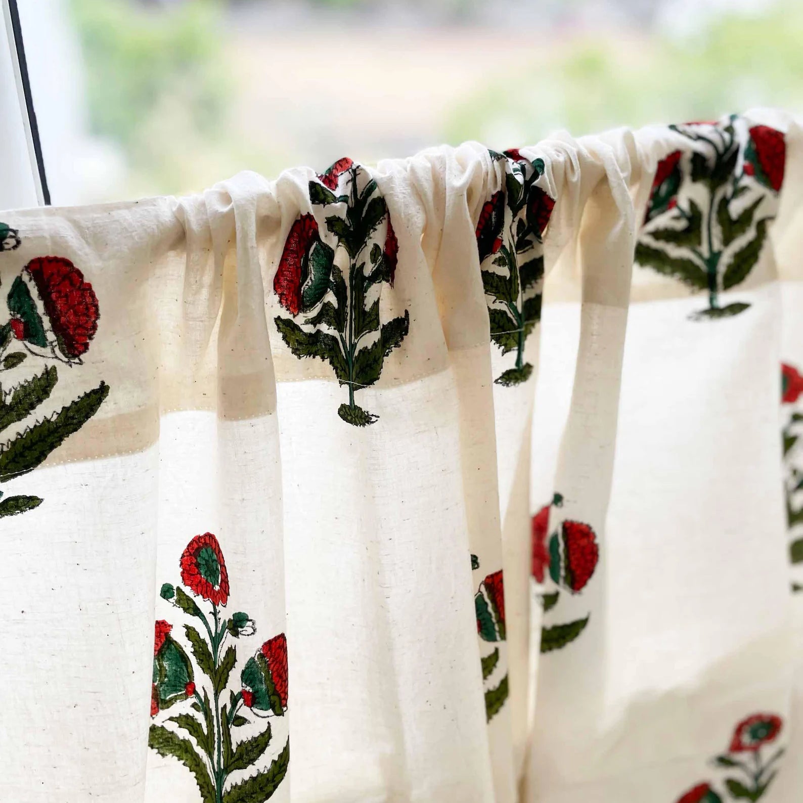 Rust and green poppy floral kitchen curtain panel, hand printed on white cotton.
