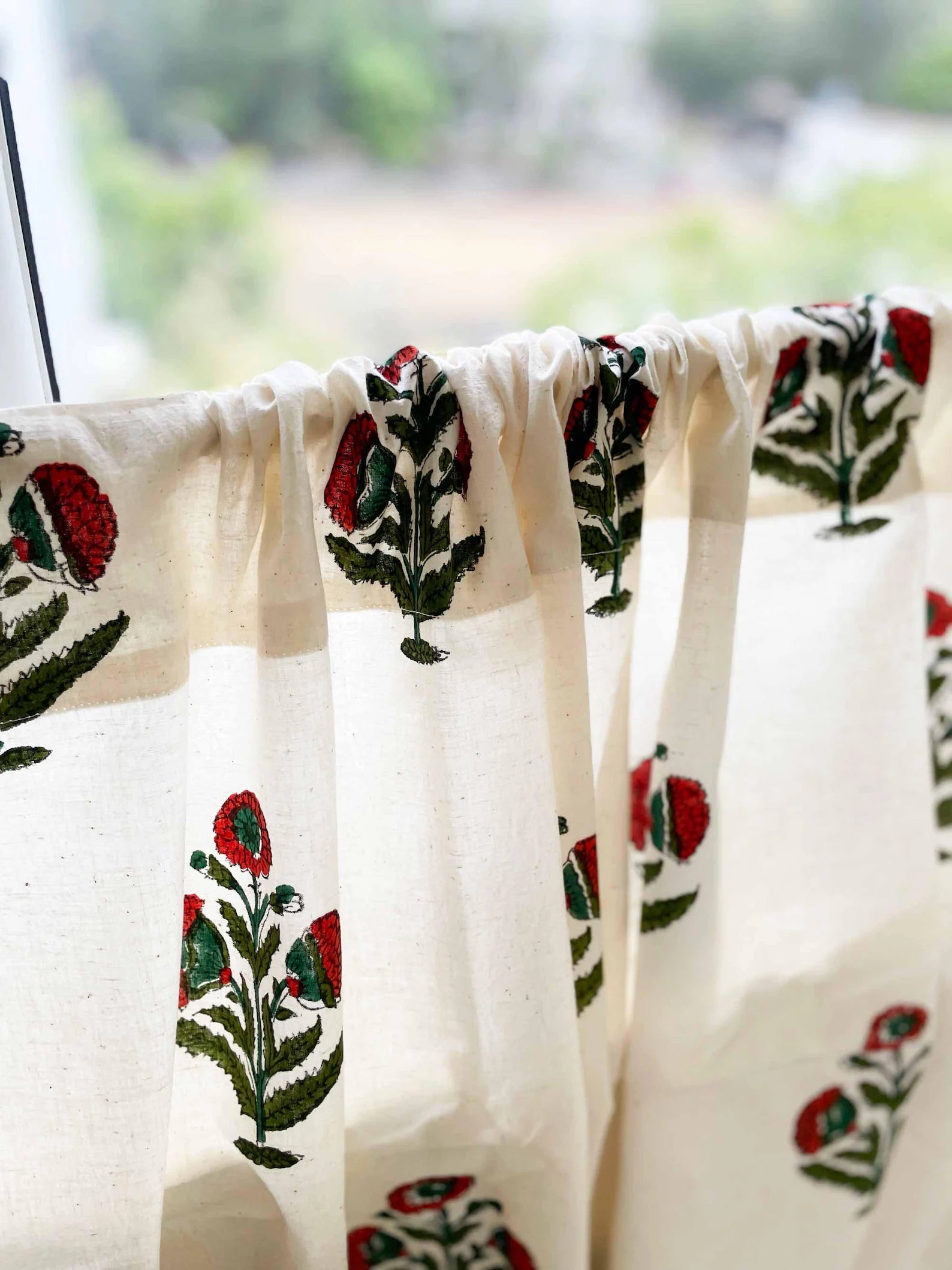 Rust and green poppy floral kitchen curtain panel, hand printed on white cotton.