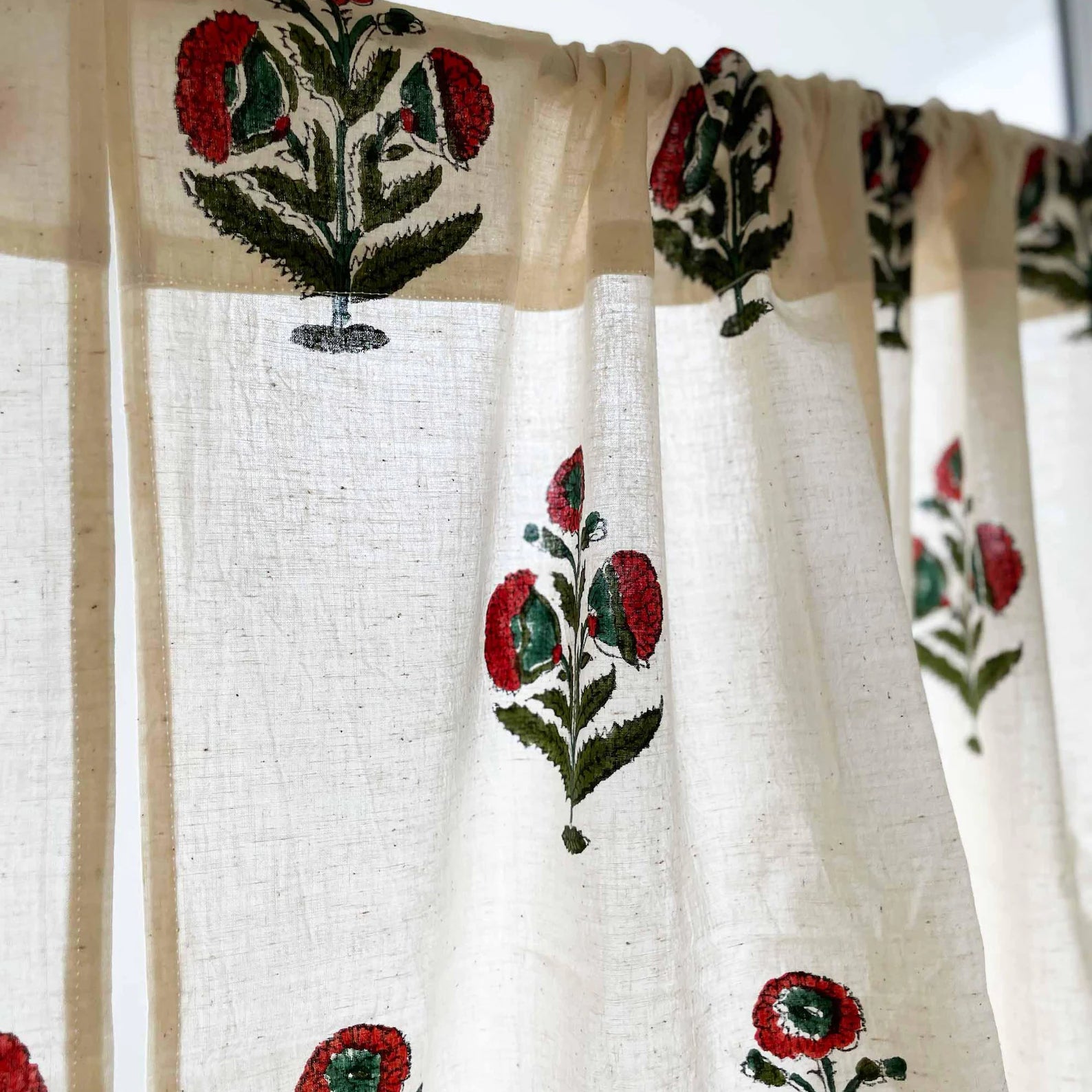 Cafe curtain with Mughal-inspired rust and green poppy motif, perfect for cupboards or windows.