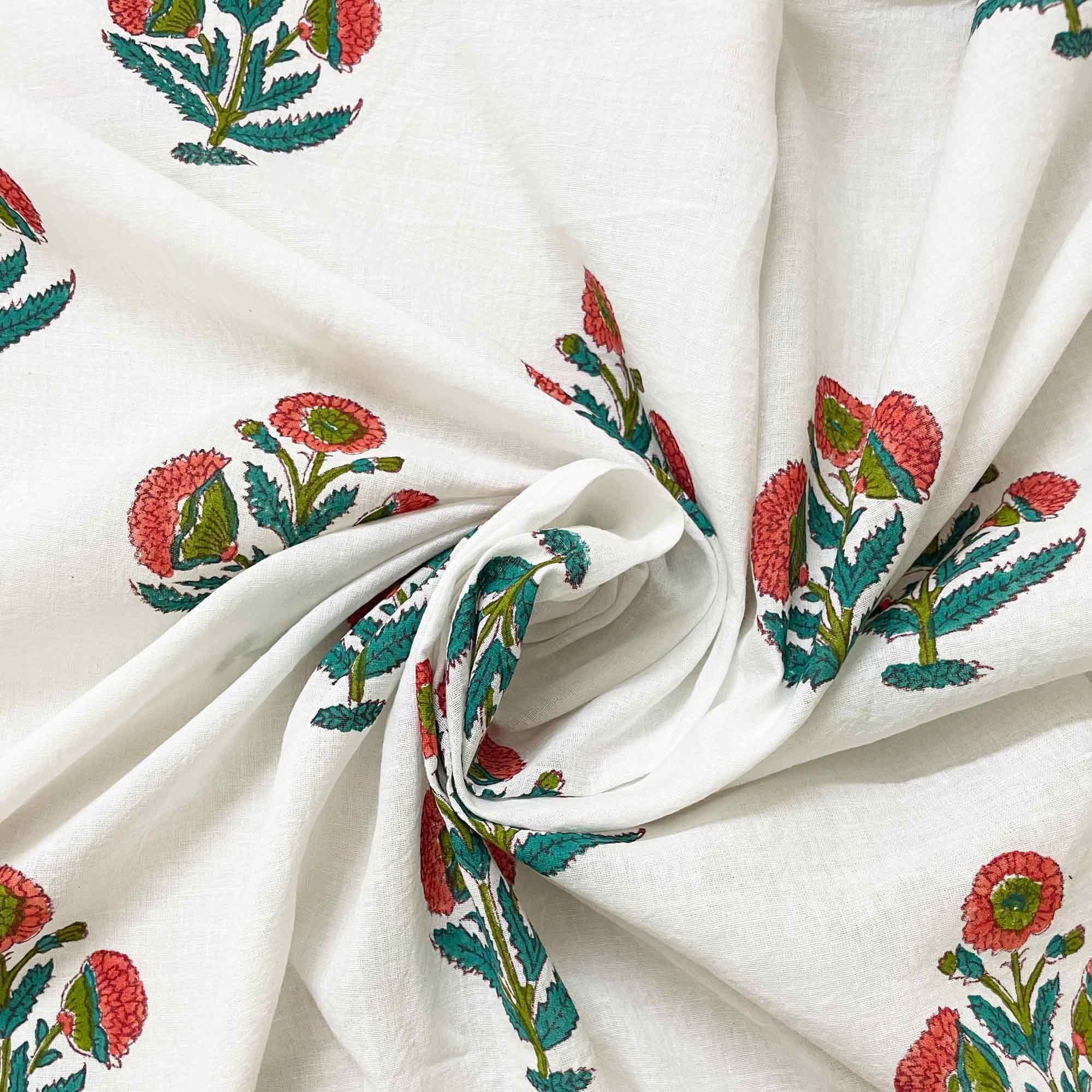 White fabric with colorful floral embroidery