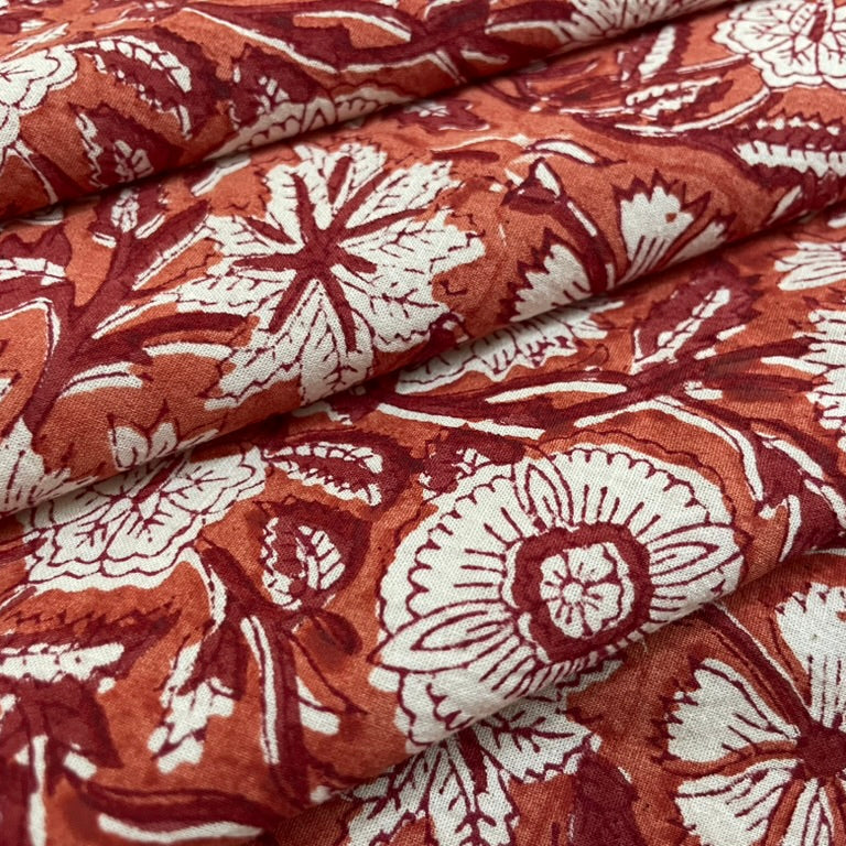 Floral patterned fabric with red and white colors