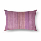 Purple and lavender striped silk pillow on a white background