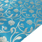 Teal and silver polyester jacquard fabric