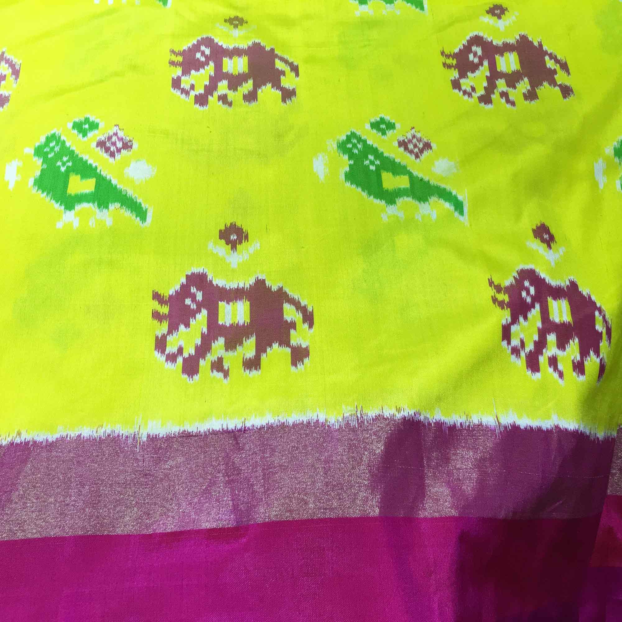 Yellow and magenta patola silk fabric